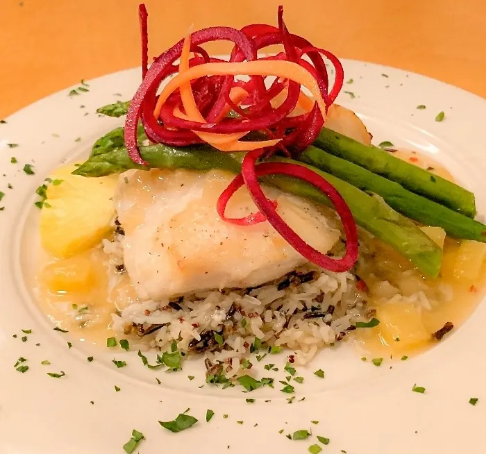 Fish with asparagus and a beet garnish